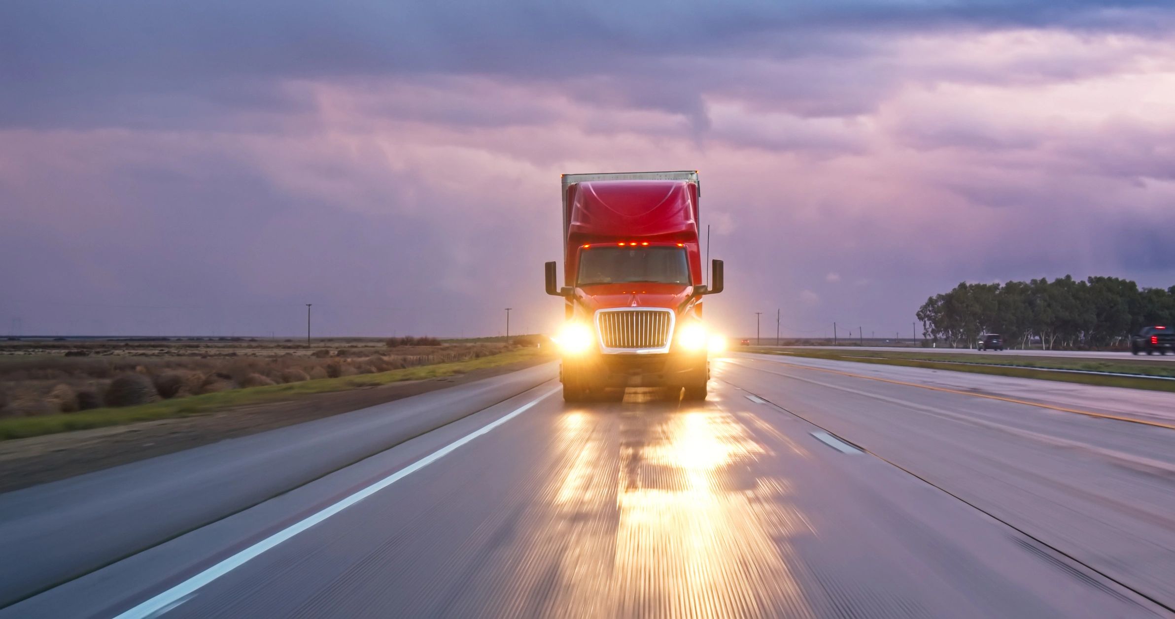Cargo truck driving on interstate highway