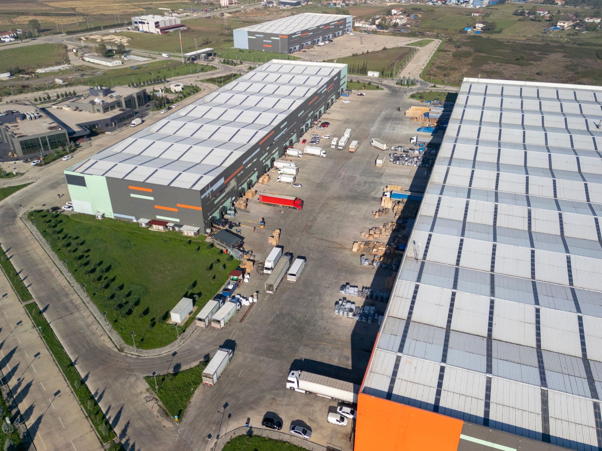 Distribution center with trucks serving delivery routes