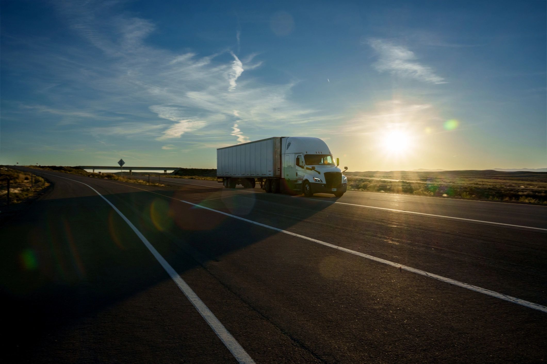 Commercial truck traveling on an open highway